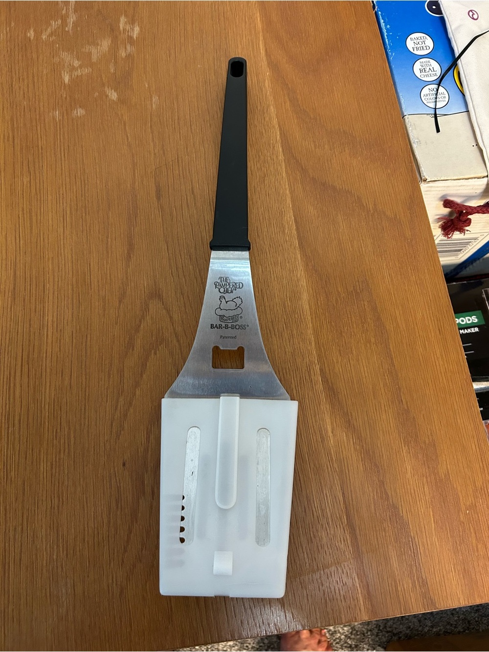 The Pampered Chef BBQ Spatula with Black Handle and White Guard